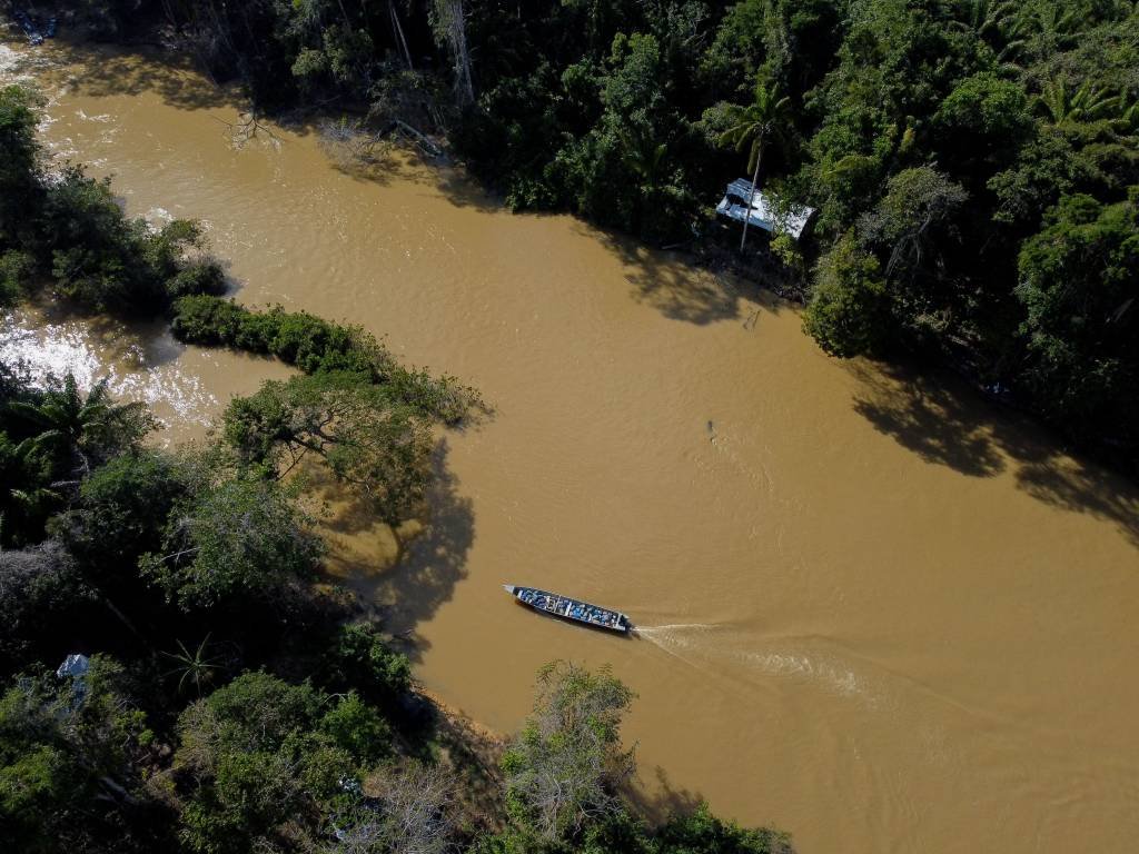 Aerial view of Porto do Arame, located on the banks of the Uraricoera river, which is the main access point for people trying to leave illegal mining sites inside Yanomami indigenous lands in Roraima state, Brazil on February 7, 2023. (Photo by MICHAEL DANTAS / AFP) (Photo by MICHAEL DANTAS/AFP via Getty Images) (MICHAEL DANTAS/AFP/Getty Images)