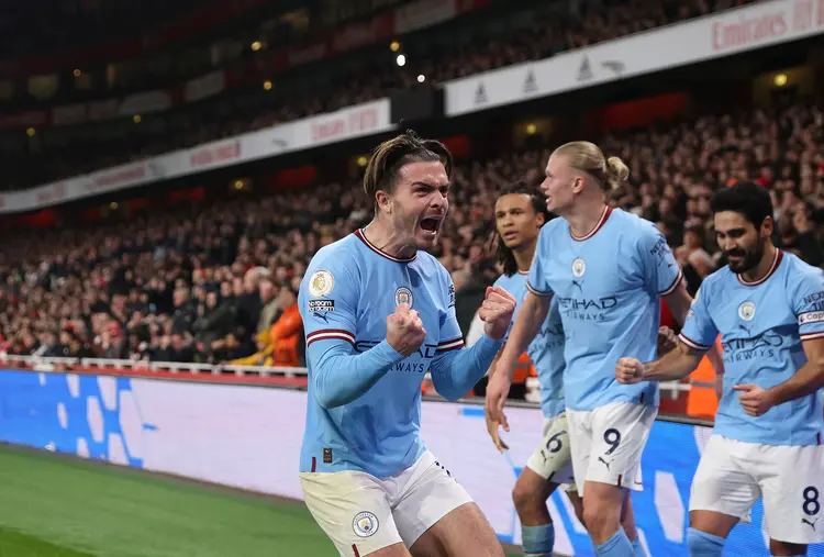 LONDON, ENGLAND - FEBRUARY 15: Jack Grealish of Manchester City celebrates scoring the team's second goal during the Premier League match between Arsenal FC and Manchester City at Emirates Stadium on February 15, 2023 in London, England. (Photo by Julian Finney/Getty Images) (Julian Finney/Getty Images)