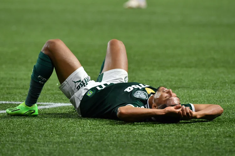 Palmeiras' Brazilian forward Rony lies on the field during the Copa Libertadores all-Brazilian second leg semifinal football match between Palmeiras and Athletico Paranaense, at the Allianz Parque stadium, in Sao Paulo, Brazil, on September 6, 2022. (Photo by NELSON ALMEIDA / AFP) (Photo by NELSON ALMEIDA/AFP via Getty Images) (Nelson Almeida/Getty Images)