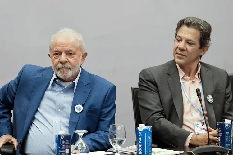 Presidente Luiz Inácio Lula da Silva e ministro da Fazenda Fernando Haddad: Petrobras em pauta (JOSEPH EID/AFP/Getty Images)