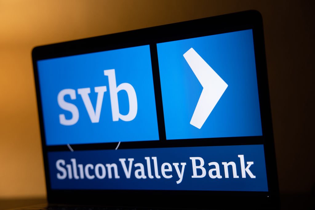 The Silicon Valley Bank logo on a laptop screen arranged in Riga, Latvia, on Friday, March 10, 2023. Panic spread across the startup world as worries about the financial health of Silicon Valley Bank, a major lender to fledgling companies, prompted Peter Thiels Founders Fund and other prominent venture capitalists to advise portfolio businesses to withdraw their money, even as the banks top executive urged calm. Photographer: Andrey Rudakov/Bloomberg via Getty Images (Andrey Rudakov/Bloomberg/Getty Images)