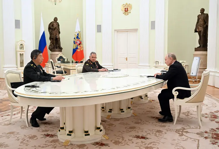 Russian President Vladimir Putin and Russian Defence Minister Sergei Shoigu meet with Chinese Defence Minister Li Shangfu at the Kremlin in Moscow on April 16, 2023. (Photo by Pavel BEDNYAKOV / SPUTNIK / AFP) (Photo by PAVEL BEDNYAKOV/SPUTNIK/AFP via Getty Images) (PAVEL BEDNYAKOV/Getty Images)