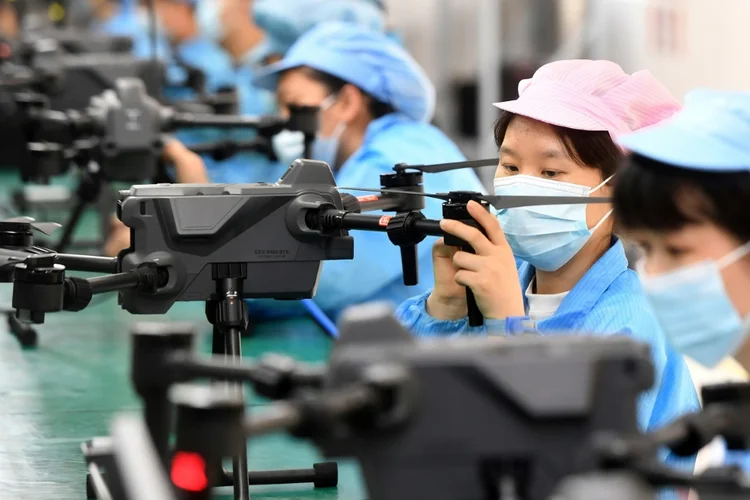 No quarto trimestre de 2022, o Produto Interno Bruto (PIB) do gigante asiático cresceu 2,9% (AFP/AFP Photo)