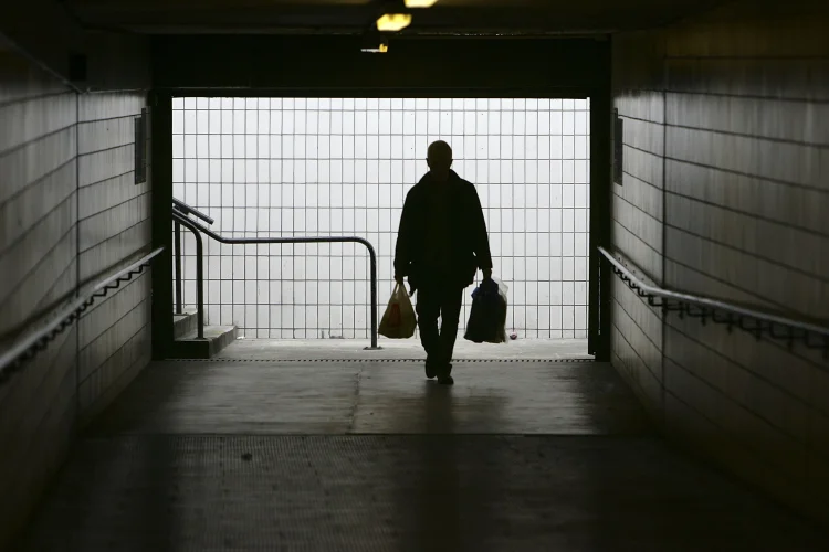 PRESTON, UNITED KINGDOM - JANUARY 23: A man makes his way home at Preston bus station on January 23, 2005, Preston, England. Scientists from Cardiff University have worked out a formula to calculate that January 23 is the most depressing day of the year. The formula 1/8W+(D-d) 3/8xTQ MxNA where W is weather, D is debt, money (d) due on January's pay day and T is the time since Christmas, Q is the period since the failure to quit a bad habit, M for motivational levels and NA is the need to take action and do something about it. (Photo by Christopher Furlong/Getty Images) (Christopher Furlong/Getty Images)