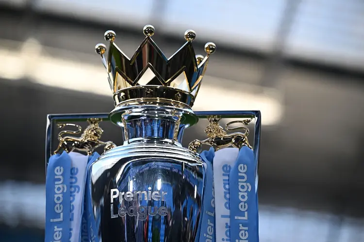 The Premier League trophy is pictured ahead of the English Premier League football match between Manchester City and Arsenal at the Etihad Stadium in Manchester, north west England, on April 26, 2023. (Photo by Oli SCARFF / AFP) / RESTRICTED TO EDITORIAL USE. No use with unauthorized audio, video, data, fixture lists, club/league logos or 'live' services. Online in-match use limited to 120 images. An additional 40 images may be used in extra time. No video emulation. Social media in-match use limited to 120 images. An additional 40 images may be used in extra time. No use in betting publications, games or single club/league/player publications. /  (Photo by OLI SCARFF/AFP via Getty Images) (OLI SCARFF/Getty Images)