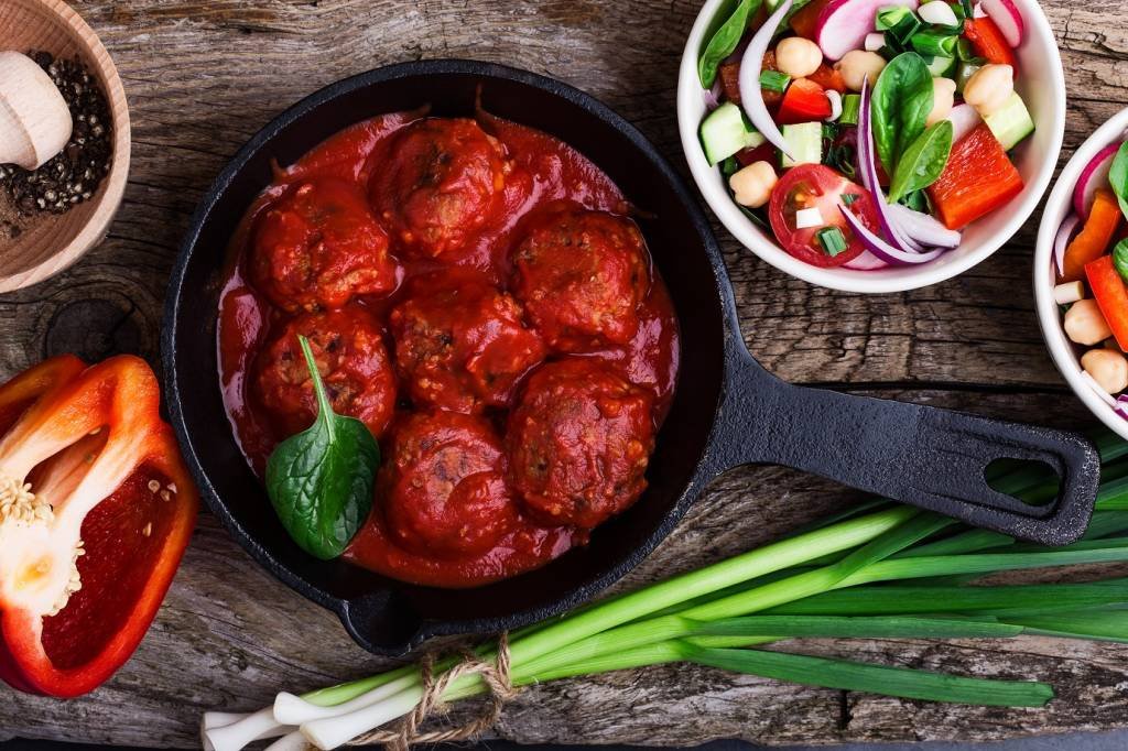 Chickpea brown rice veggie meatballs with fresh vegetables and chickpea salad