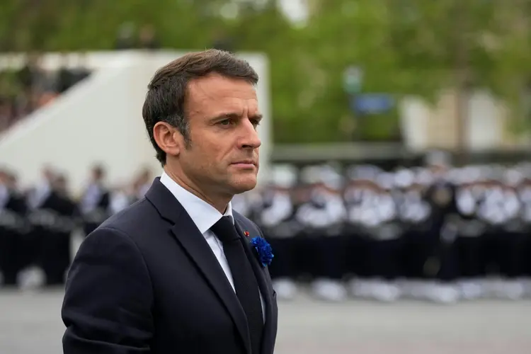 Macron: "Parece que houve ajuda e cooperação com o Hamas, mas continuo cauteloso neste ponto, enquanto não tivermos informações consolidadas que sejam totalmente certas" (AFP/AFP Photo)