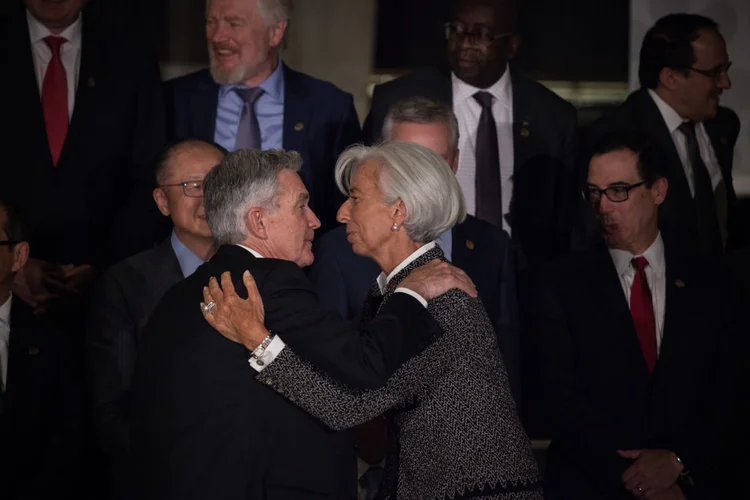 Jerome Powell, presidente do Fed, e Christine Lagarde presidente do BCE (Erica Canepa/Bloomberg via/Getty Images)