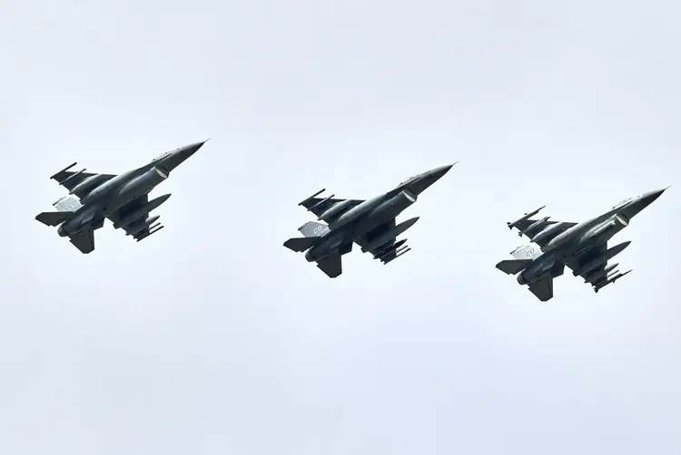 03 June 2023, Schleswig-Holstein, Jagel: Three F16 fighter jets from the U.S. fly in formation shortly before they land at the air base in Jagel, Schleswig-Holstein. A total of seven aircraft arrived at the airfield of Tactical Air Force Squadron 51 "Immelmann" on Saturday. According to the Air Force, 25 nations with 250 aircraft and 10,000 servicemen and women are to take part in the "Air Defender 2023" exercise from June 12 to 23 under German leadership. Photo: Georg Wendt/dpa (Photo by Georg Wendt/picture alliance via Getty Images) (Georg Wendt/picture alliance/Getty Images)