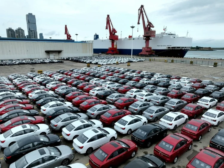 A ameaça de recessão nos Estados Unidos e na Europa, aliada à inflação, provocou a redução na demanda por produtos chineses

 (AFP/AFP Photo)