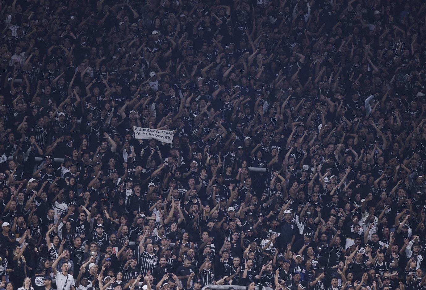 SAO PAULO, BRAZIL - JUNE 28: Fans of Corinthians cheer during a match between Corinthians and Liverpool as part of Copa CONMEBOL Libertadores 2023 at Arena Corinthians on June 28, 2023 in Sao Paulo, Brazil. (Photo by Alexandre Schneider/Getty Images)