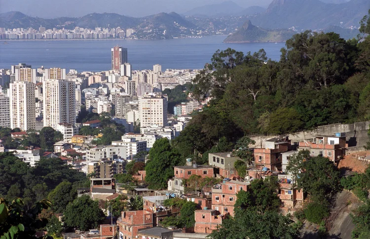 The construction of fragile and illegal homes on the city mountains, creating the Favelas, started decades ago and never stopped. (Luoman/Getty Images)