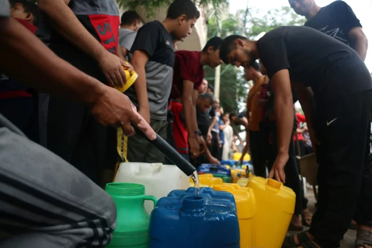 Israel-Hamas:O OCHA informou que 117 caminhões entraram em Gaza desde que as entregas de ajuda foram retomadas no enclave palestino de 2,4 milhões de pessoas (AFP/AFP)