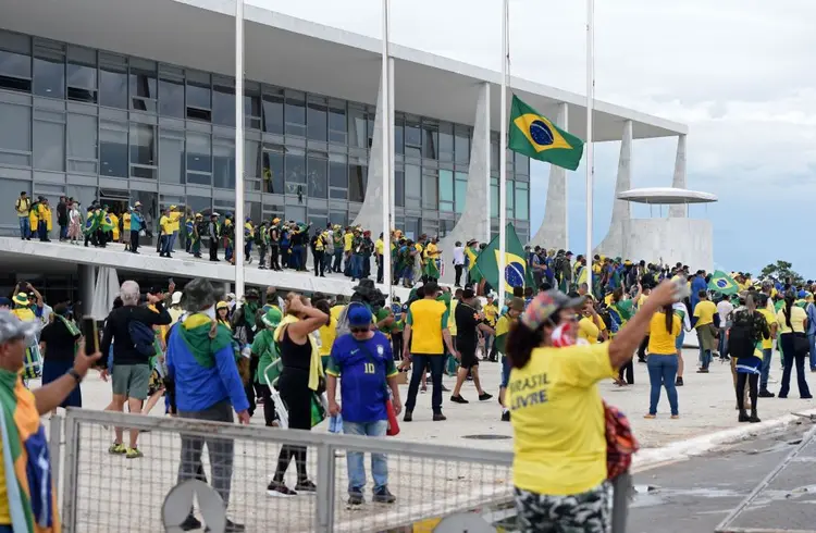 8 de janeiro de 2023: petistas lembram dia de atos golpistas promovidos por apoiadores de Bolsonaro  (Divulgação: TON MOLINA / Colaborador/Getty Images)