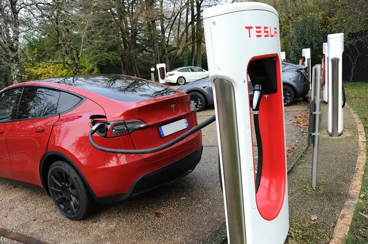 Tesla model Y supercharger charging. (Universal Images/Getty Images)