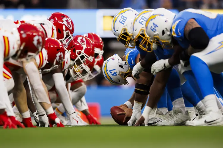 INGLEWOOD, CALIFORNIA - JANUARY 7: Kansas City Chiefs defense and Los Angeles Chargers offense at the line of scrimmage before an extra point attempt during a game at SoFi Stadium on January 7, 2024 in Inglewood, California. (Photo by Ric Tapia/Getty Images)