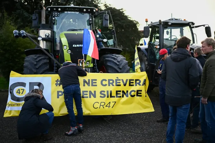 "Não somos bandidos. Só queremos respostas, porque este é o nosso último comboio, a nossa última luta pelos agricultores, diz mebro o sindicato (AFP/AFP)