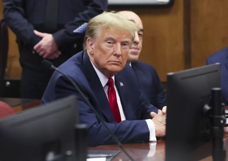 NEW YORK, NY - FEBRUARY 15: Republican presidential candidate, former U.S. President Donald Trump attends a pre-trial hearing at Manhattan Criminal Court on February 15, 2024 in New York City. Trump was charged with 34 counts of falsifying business records last year, which prosecutors say was an effort to hide a potential sex scandal, both before and after the 2016 presidential election. Judge Juan Manuel Merchan is expected to rule whether the trial will begin as scheduled on March 25.   Brendan McDermid-Pool/Getty Images/AFP (Photo by POOL / GETTY IMAGES NORTH AMERICA / Getty Images via AFP) (Brendan McDermid-Pool/Getty Images)