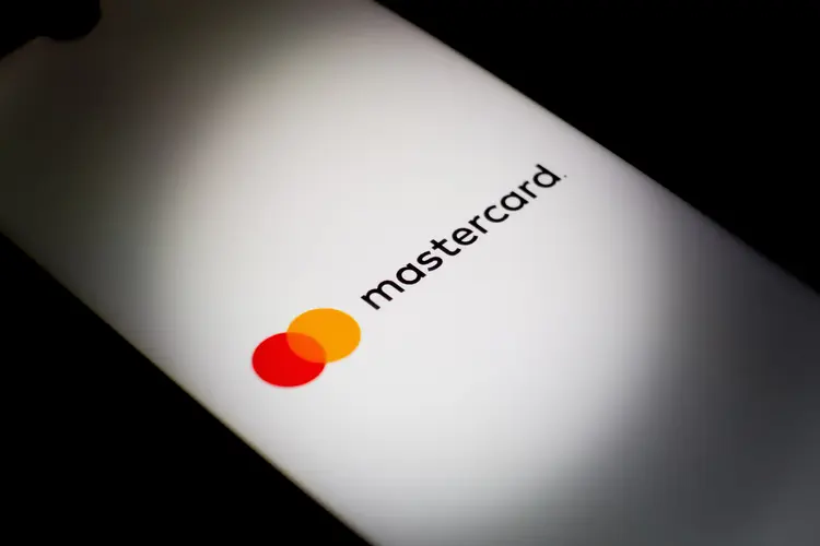 The Mastercard logo is being displayed on a smartphone screen in Athens, Greece, on December 24, 2023. (Photo by Nikolas Kokovlis/NurPhoto via Getty Images)
