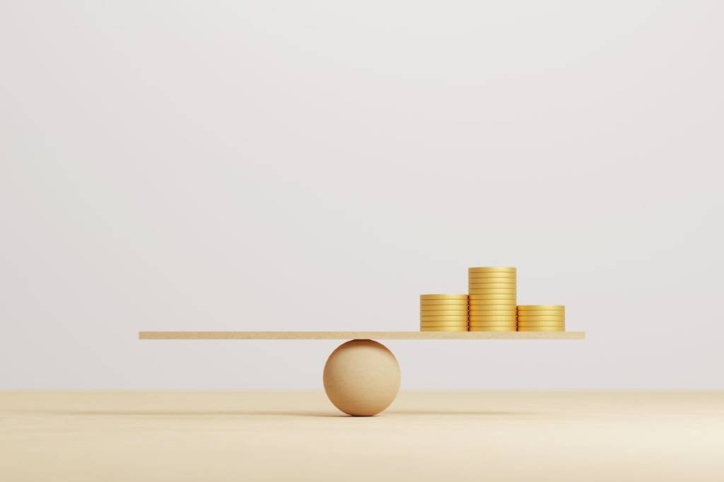Money coin stack on wood scale seesaw and copy space. Save money and investment. Compare balance concept. 3d illustration (AdobeStock)