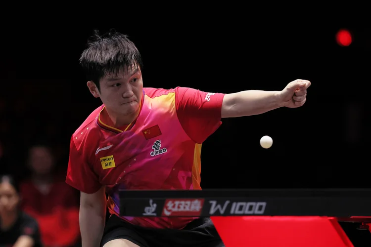 Zhendong durante partida no torneio em Cingapura