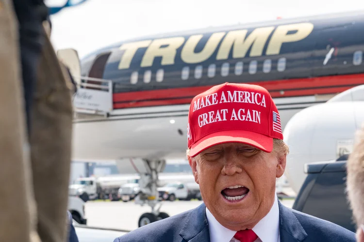 ATLANTA, GEORGIA - APRIL 10: Former U.S. President Donald Trump speaks to the media as he arrives at the Atlanta Airport on April 10, 2024 in Atlanta, Georgia. Trump is visiting Atlanta for a campaign fundraising event he is hosting.   Megan Varner/Getty Images/AFP (Photo by Megan Varner / GETTY IMAGES NORTH AMERICA / Getty Images via AFP) (Getty Images via AFP))