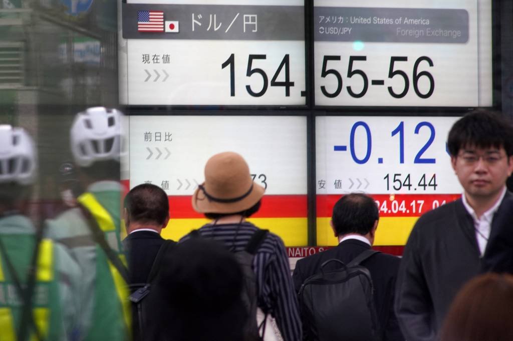 Bolsas na Ásia voltam a cair e índice de referência "apaga" ganhos do ano