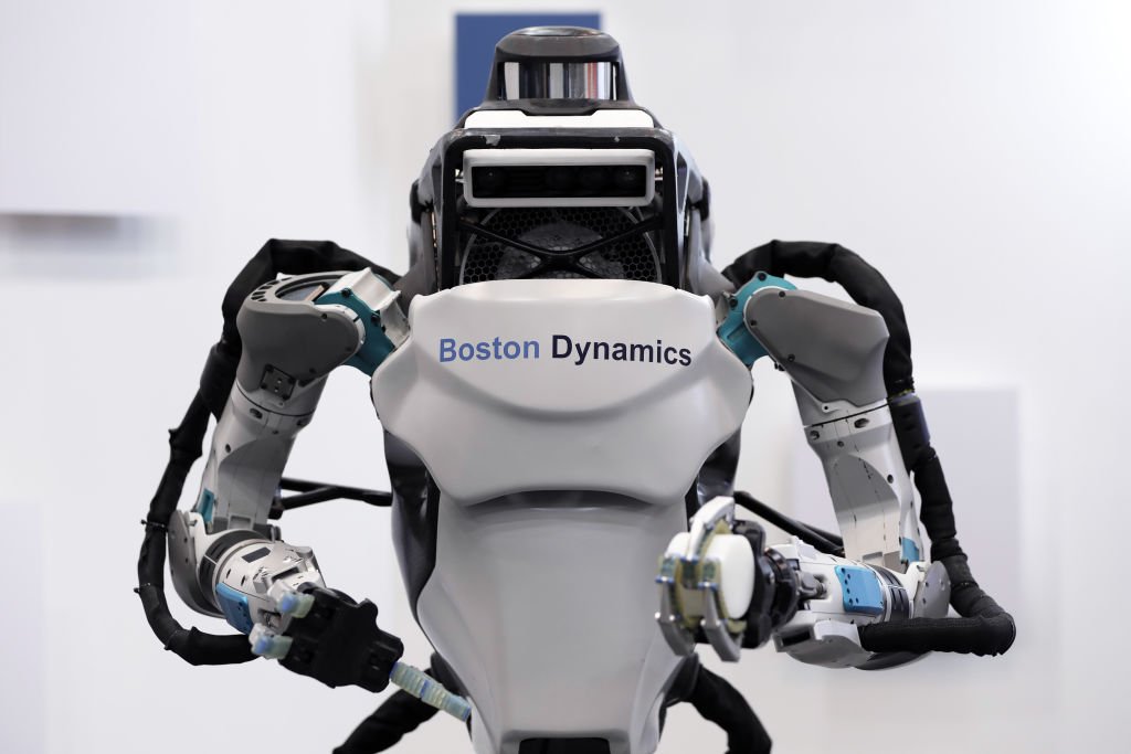 A Boston Dynamics Inc. Atlas humanoid robot is displayed at the SoftBank Robot World 2017 in Tokyo, Japan, on Tuesday, Nov. 21, 2017. SoftBank Chief Executive Officer Masayoshi Son has put money into robots, artificial intelligence, microchips and satellites, sketching a vision of the future where a trillion devices are connected to the internet and technology is integrated into humans. Photographer: Kiyoshi Ota/Bloomberg via Getty Images