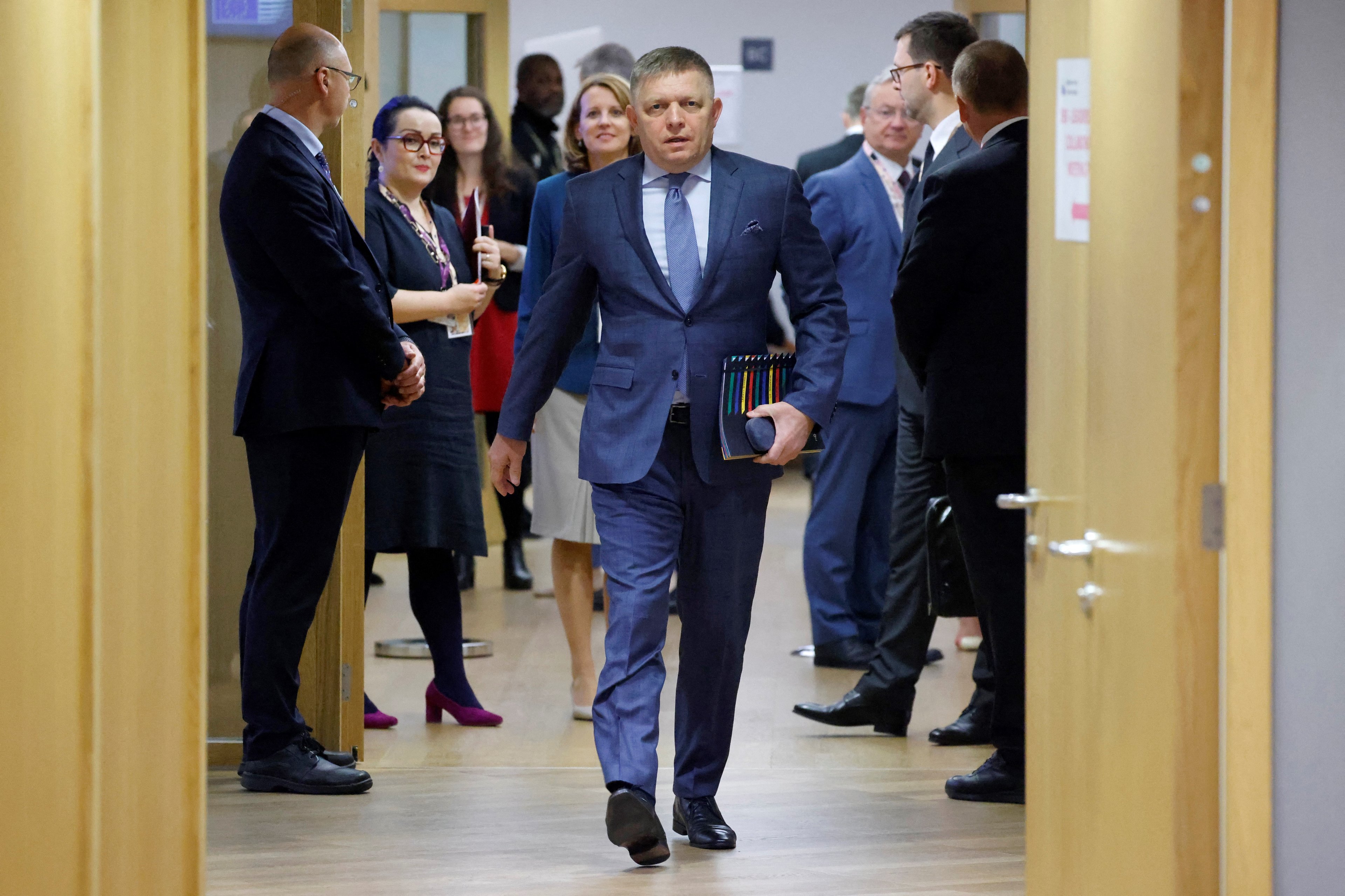 (FILES) Slovakia's Prime Minister Robert Fico arrives prior to the start of a EU leaders Summit at The European Council Building in Brussels on October 26, 2023. Slovak Prime Minister Robert Fico was on May 15, 2024 shot and hospitalised after a cabinet meeting in the central town of Handlova, local media said. (Photo by Ludovic MARIN / AFP)