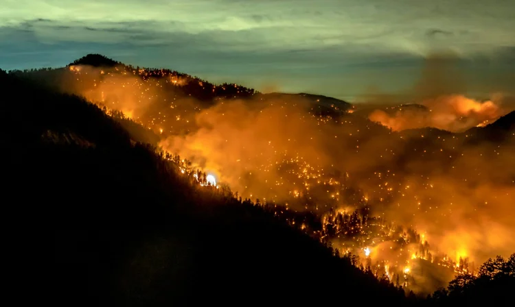 Impacto: desastres naturais ou fenômenos meteorológicos graves, como inundações e incêndios florestais, influenciaram no bolso dos americanos (AFP Photo)