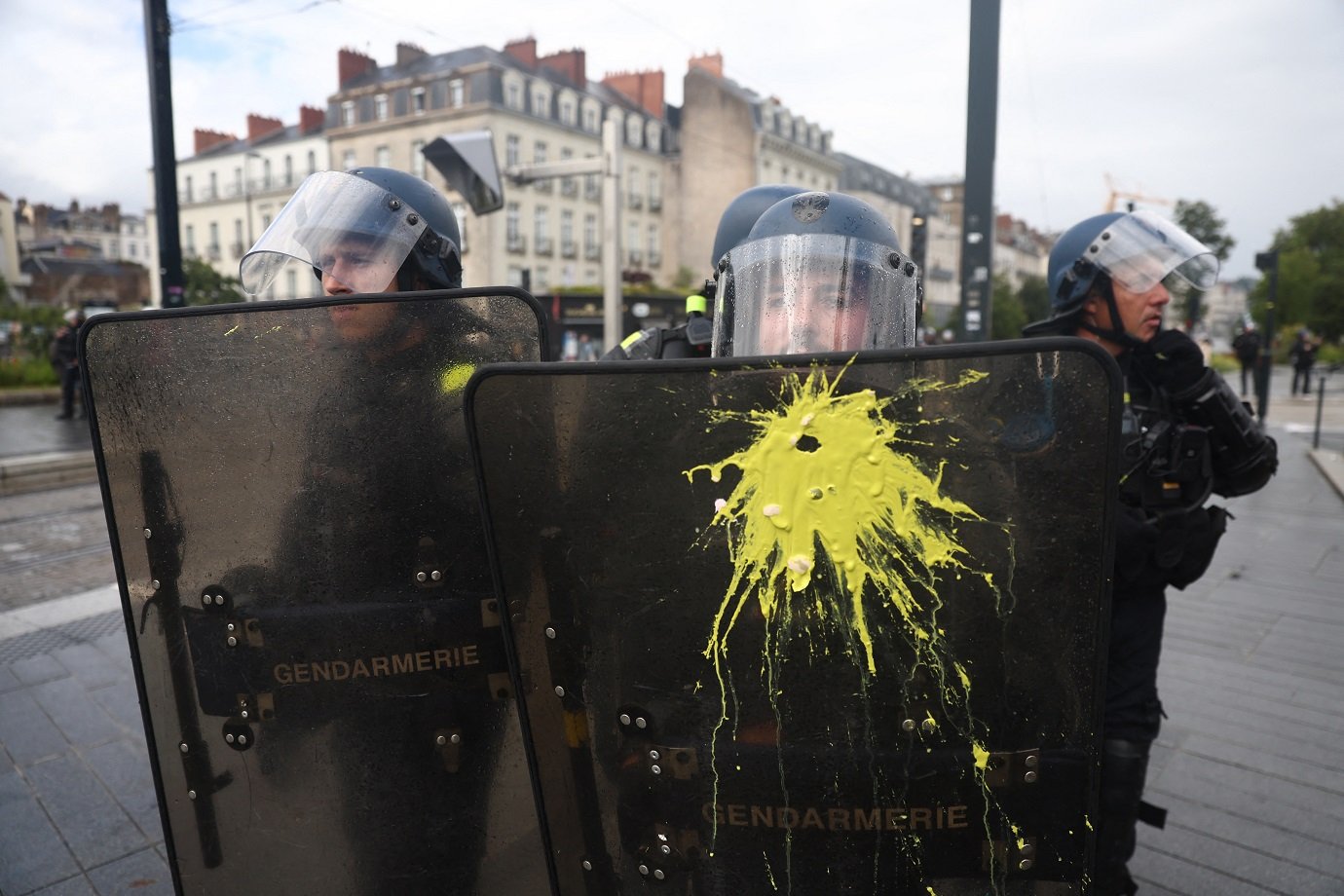 French Gendarmerie officers hold riot shields during a demonstration against the far right, in Nantes, western France, on June 15, 2024. Less than a week after the earthquake of the dissolution, opponents of the far-right are called by trade unions, associations and the left-wing coalition of the "Nouveau Front Populaire" to take to the streets across France after the French President called legislative elections following far-right parties' significant gains in European Parliament elections. (Photo by ROMAIN PERROCHEAU / AFP)