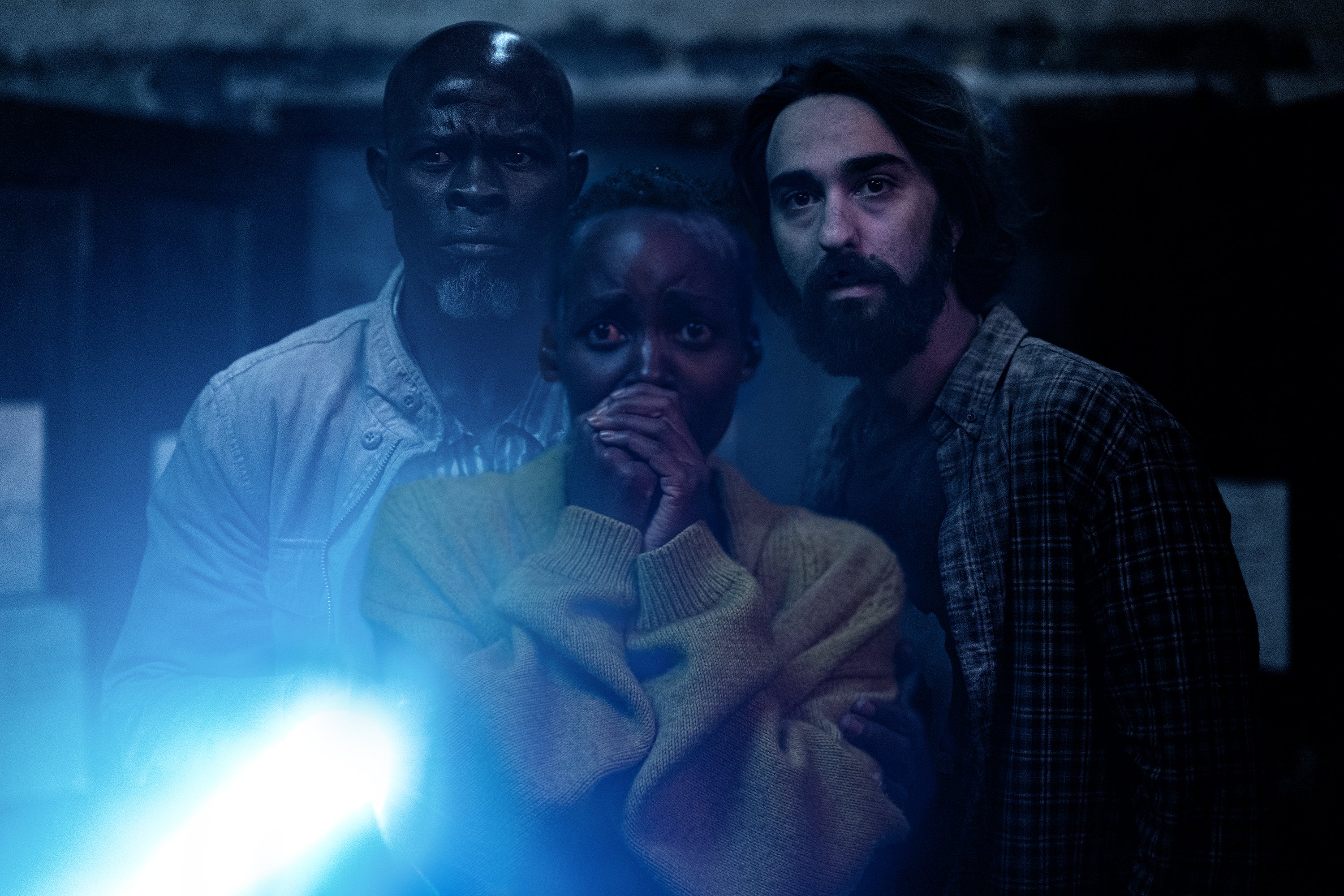 Djimon Hounsou as “Henri”, Lupita Nyong’o as “Samira” and Alex Wolff as “Reuben” in A Quiet Place: Day One from Paramount Pictures.
