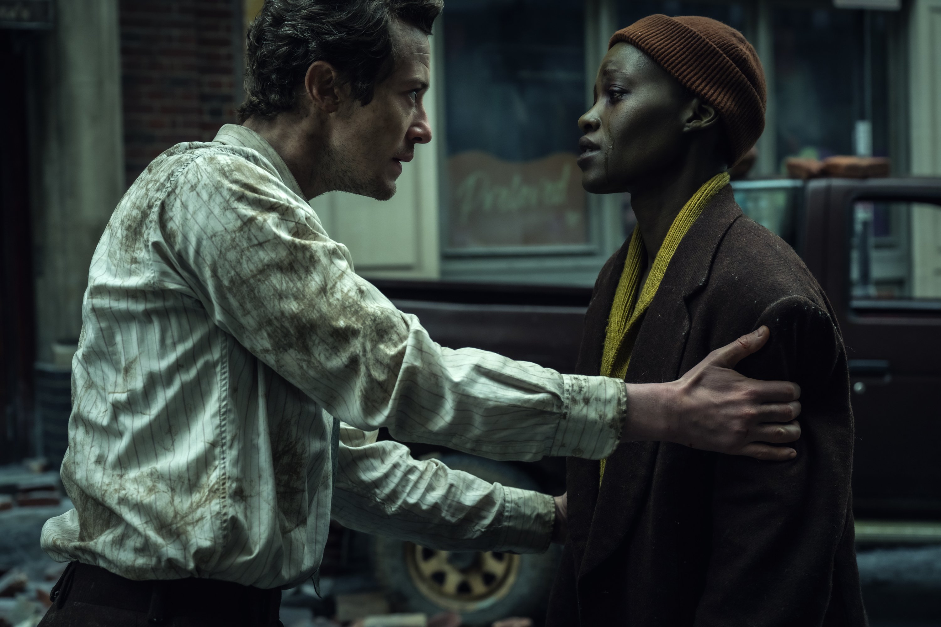 Joseph Quinn as “Eric” and Lupita Nyong’o as “Samira”  in A Quiet Place: Day One from Paramount Pictures.