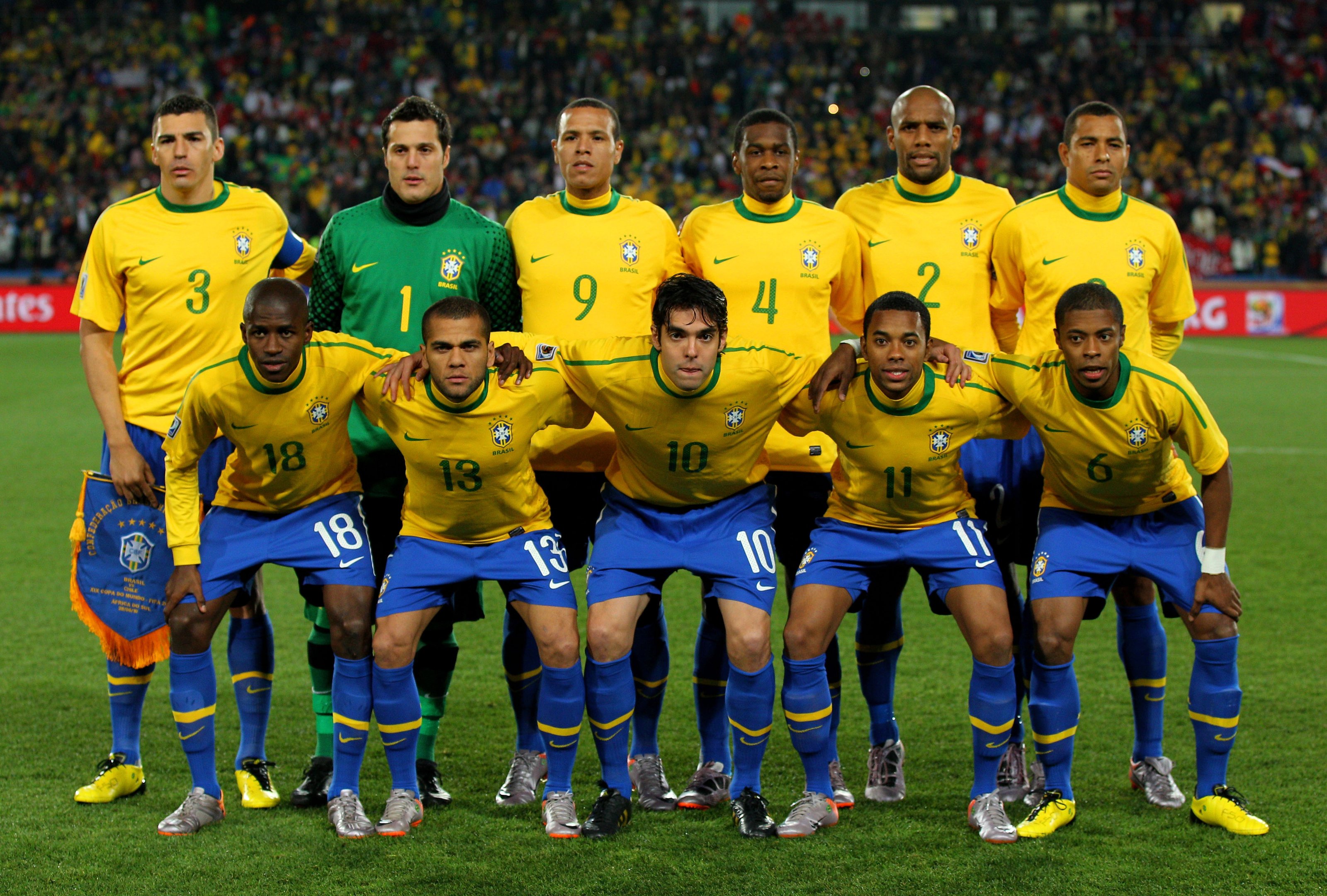 JOHANNESBURG, SOUTH AFRICA - JUNE 28:  The Brazil team line up ahead of the 2010 FIFA World Cup South Africa Round of Sixteen match between Brazil and Chile at Ellis Park Stadium on June 28, 2010 in Johannesburg, South Africa.  (Photo by Cameron Spencer/Getty Images)