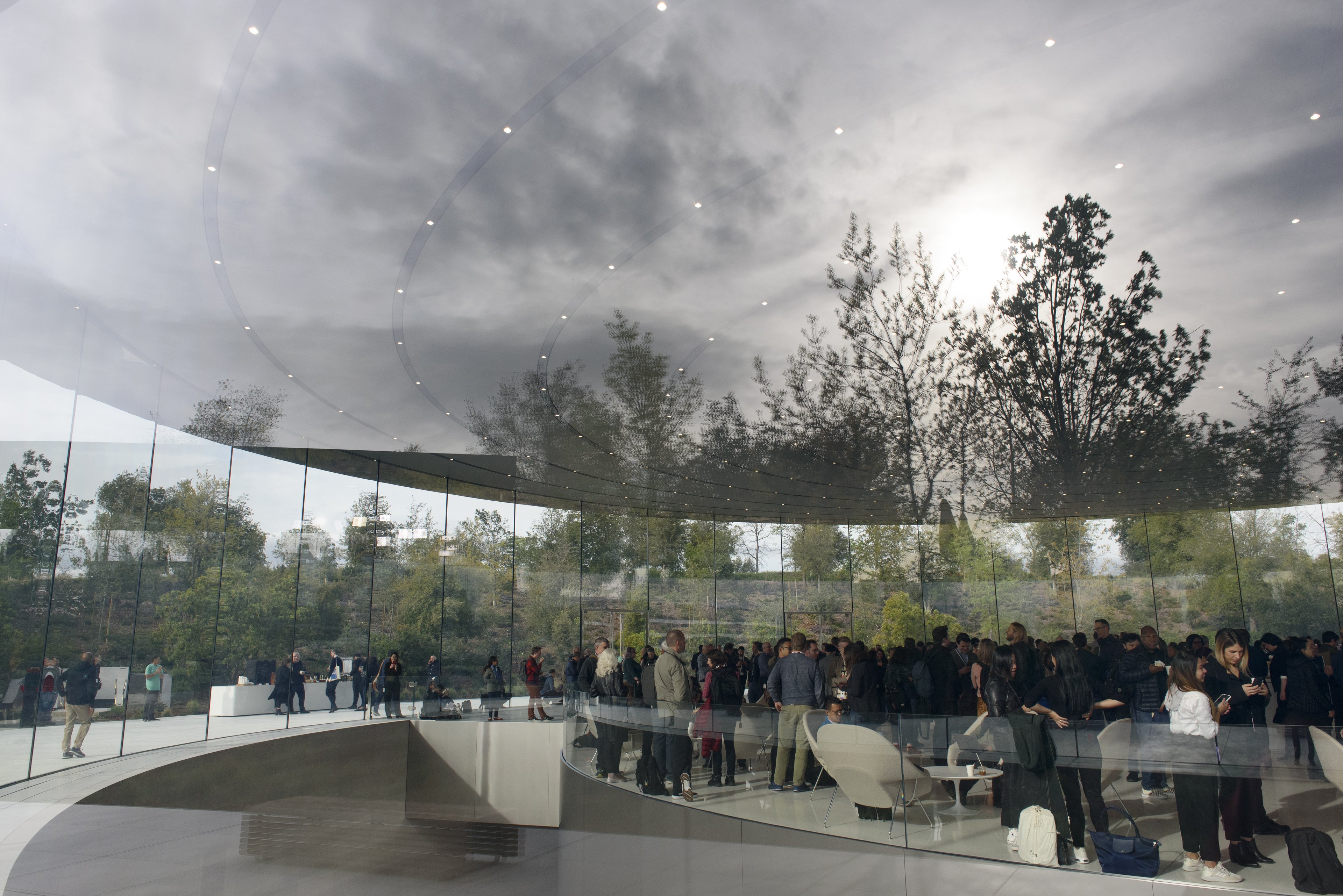 CUPERTINO, CA - MARCH 25: Attendees gather before an Apple product launch event at the Steve Jobs Theater at Apple Park on March 25, 2019 in Cupertino, California. Apple Inc. announced the launch of it's new video streaming service, and unveiled a premium subscription tier to its News app. (Photo by Michael Short/Getty Images)