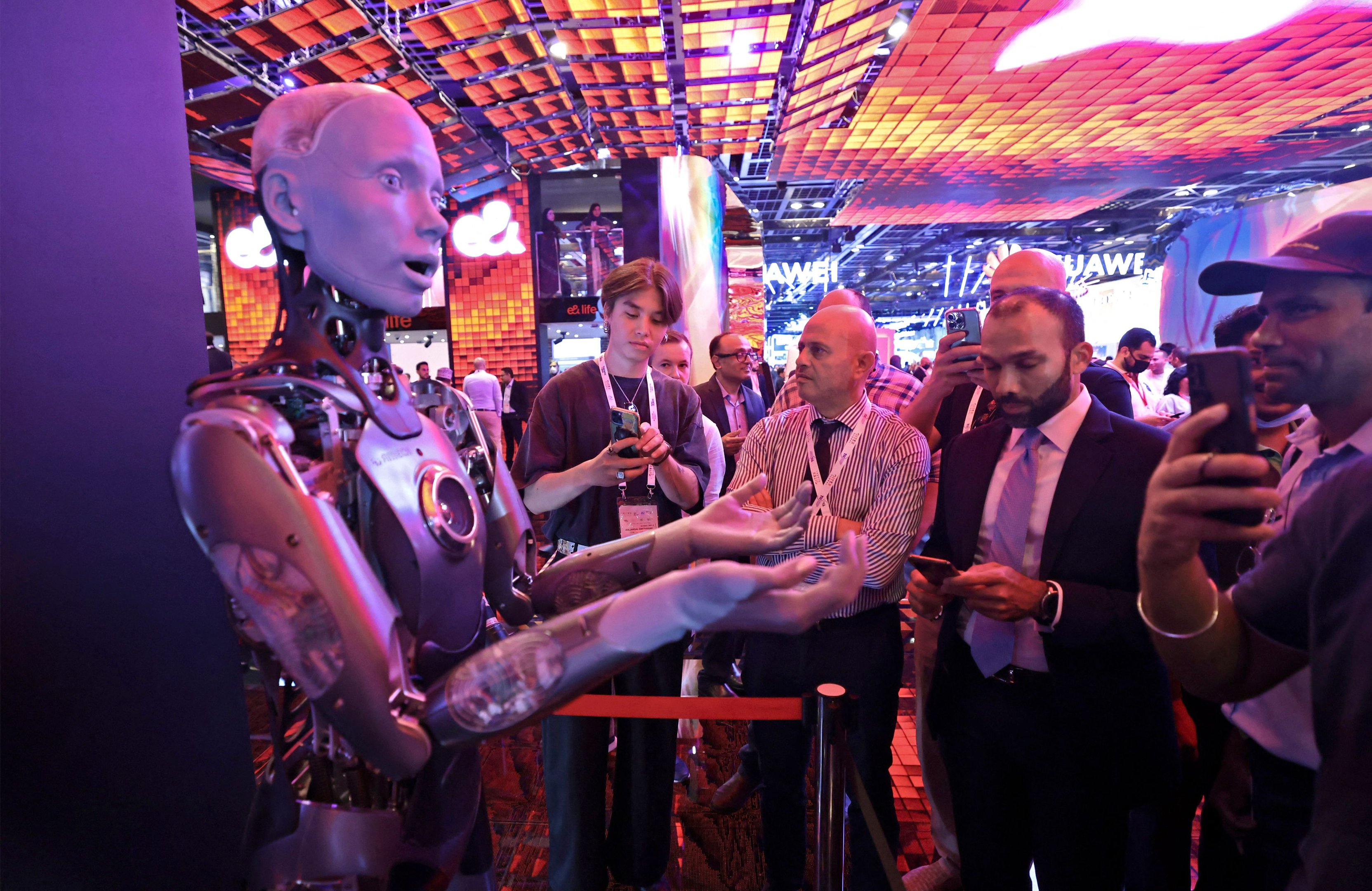 The Ameca humanoid robot greets visitors during the GITEX Global technology show at the Dubai World Trade Centre (DWTC) in the Gulf emirate, on October 12, 2022. (Photo by Karim SAHIB / AFP) (Photo by KARIM SAHIB/AFP via Getty Images)