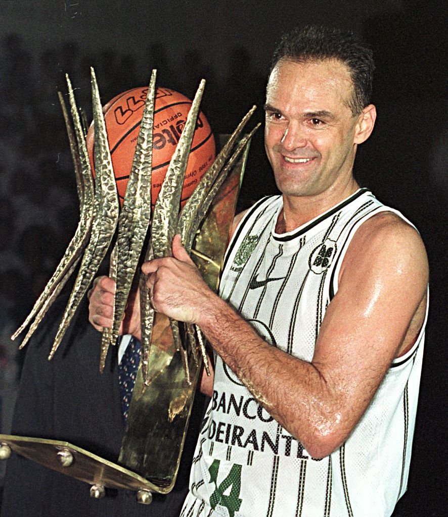 Brazilian basketball player Oscar Schmidt holds a trophy 15 March in Barueri, Brazil for his 22 years of professional play.The Brazilian basketball star Oscar Schmidt "Oscar" (40) of the team "bank Bandeirantes" raised a trophy in the form of basket after more than 40 thousand points in its 22 years of professional career during a party in Barueri by the Brazilian Championship March 15. The American Kareem Abdul Jabar holds the world record with 46 thousand 725 marked points in his career. Oscar conquered with the national team of Brazil the gold medal at the Games Pan-Americanos 1987, is facing three south american and juice in Italy from 1982 to 1993 and in Spain from 1991 to 1993.  AFP PHOTO/Marie HIPPENMEYER  (Photo by Marie Hippenmeyer/AFP via Getty Images)