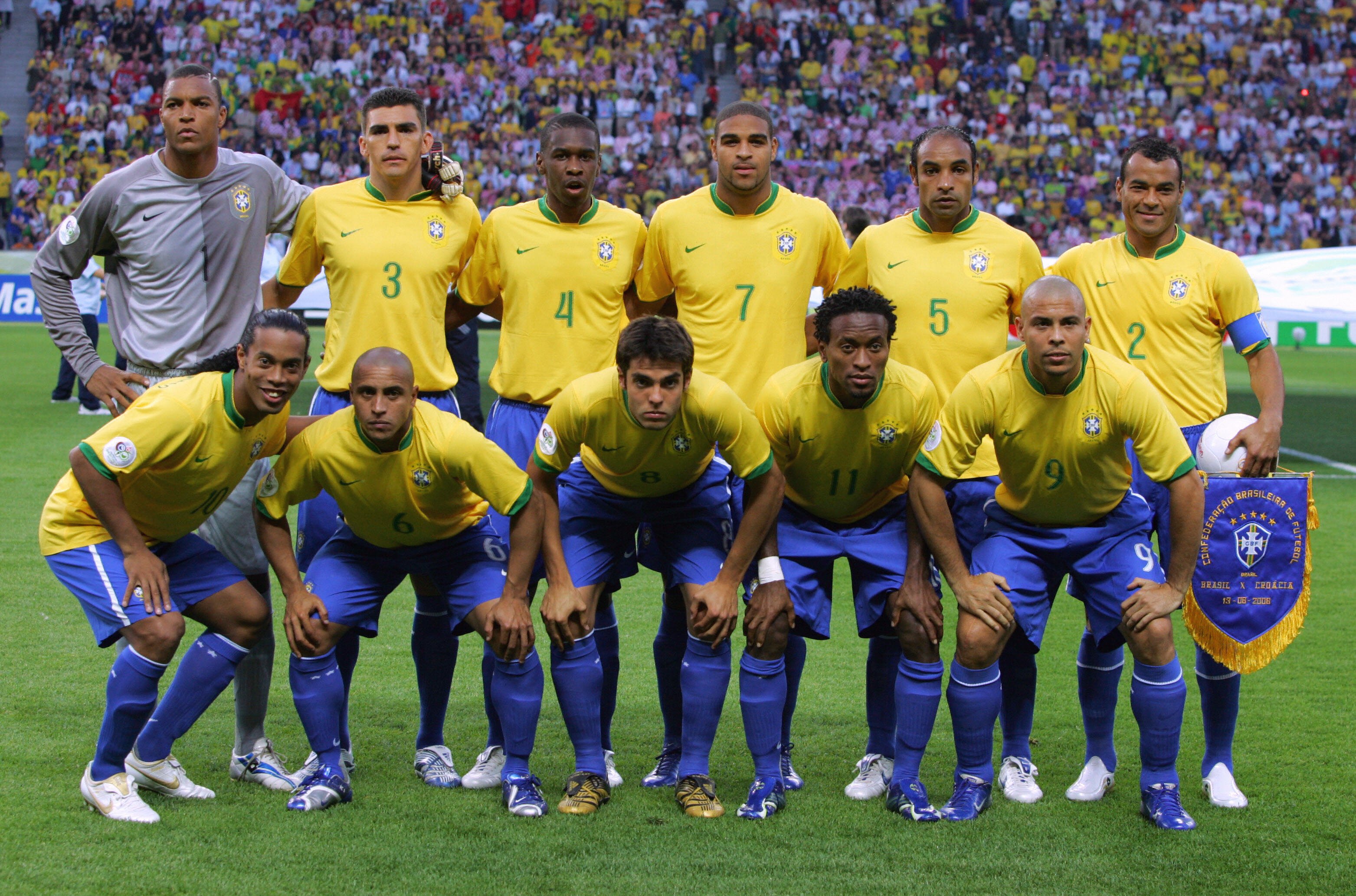 Berlin, GERMANY:  Brazilan team picture (first row fromLtoR) goalkeeper Dida, defender Lucio, defender Juan, forward Adriano, midfielder Emerson, and defender Cafu, (2nd row fromLtoR) midfielder Ronaldinho, defender Roberto Carlos, midfielder Kaka, midfielder Ze Roberto, and forward Ronaldo pose before the World Cup 2006 group F football game Brazil vs. Croatia 13 June 2006 at Berlin stadium. AFP PHOTO VANDERLEI ALMEIDA  (Photo credit should read VANDERLEI ALMEIDA/AFP via Getty Images)