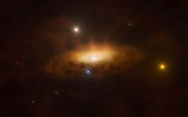 Reprodução artística de um buraco negro em pleno despertar no centro de uma galáxia (Reprodução artística de um buraco negro em pleno despertar no centro de uma/AFP)