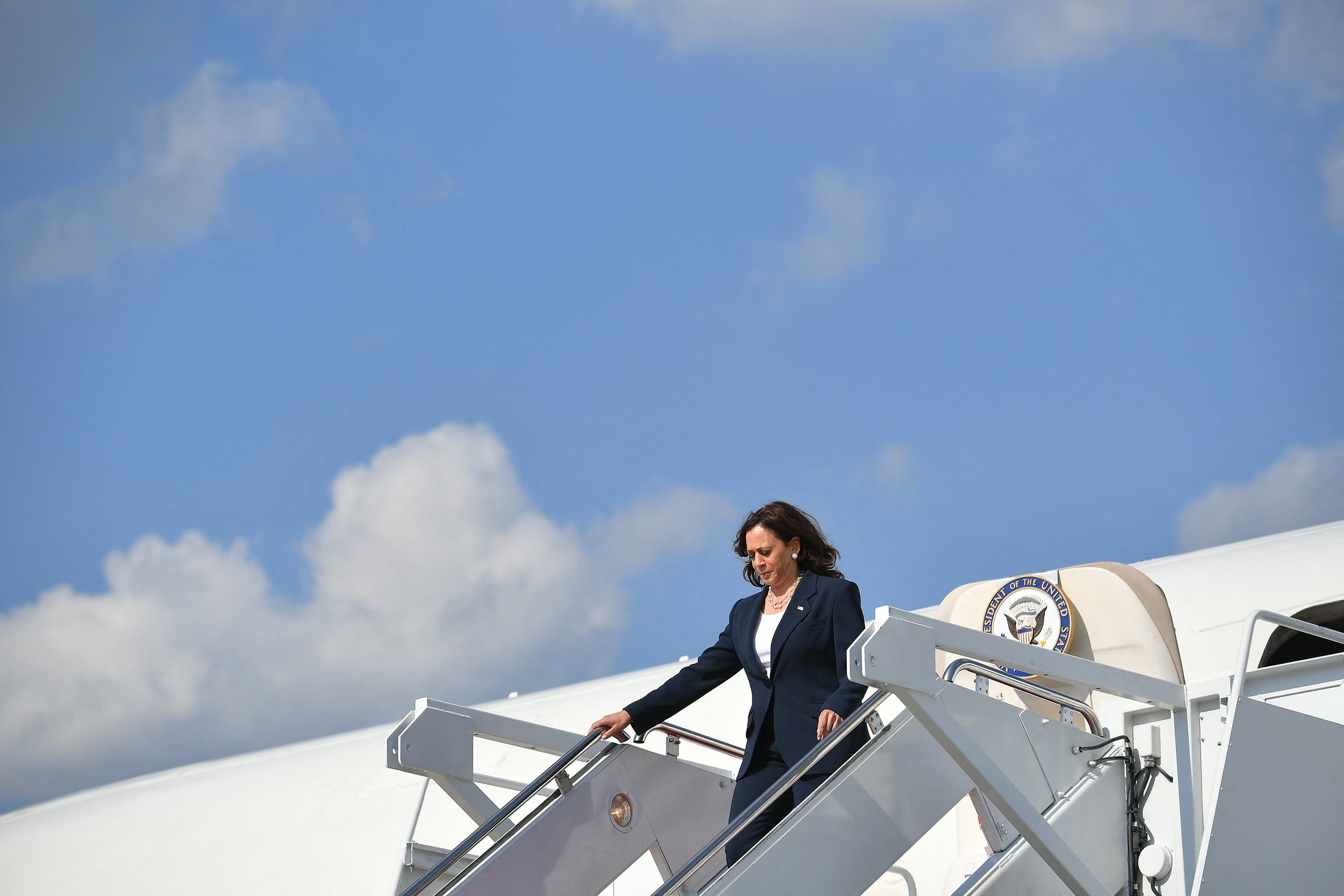 (FILES) US Vice President Kamala Harris deplanes upon arrival at Andrews Air Force Base in Maryland on June 14, 2021. Joe Biden on July 21, 2024 dropped out of the US presidential election and endorsed Vice President Kamala Harris as the Democratic Party's new nominee, in a stunning move that upends an already extraordinary 2024 race for the White House. Biden, 81, said he was acting in the "best interest of my party and the country" by bowing to weeks of pressure after a disastrous June debate against Donald Trump stoked worries about his age and mental fitness. (Photo by MANDEL NGAN / AFP)