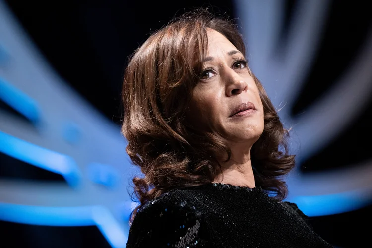 (FILES) US Vice President Kamala Harris speaks during the Phoenix Awards Dinner at the Washington Convention Center in Washington, DC on October 1, 2022. Joe Biden on July 21, 2024 dropped out of the US presidential election and endorsed Vice President Kamala Harris as the Democratic Party's new nominee, in a stunning move that upends an already extraordinary 2024 race for the White House. Biden, 81, said he was acting in the "best interest of my party and the country" by bowing to weeks of pressure after a disastrous June debate against Donald Trump stoked worries about his age and mental fitness. (Photo by Brendan Smialowski / AFP)