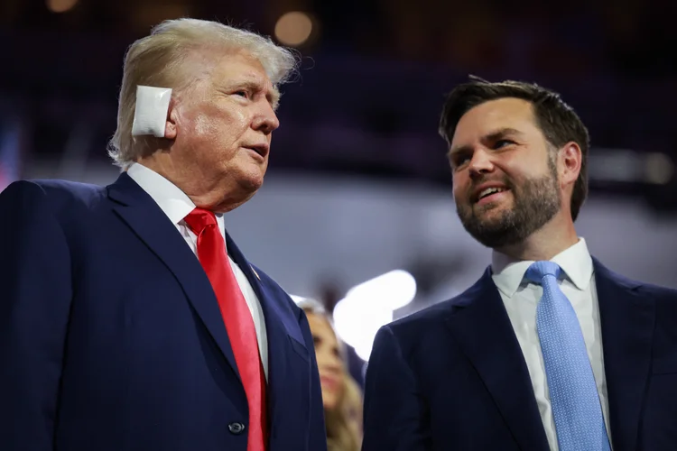 MILWAUKEE, WISCONSIN - JULY 15: Republican presidential candidate, former U.S. President Donald Trump (L) and Republican Vice Presidential candidate, U.S. Sen. J.D. Vance (R-OH) appear on the first day of the Republican National Convention at the Fiserv Forum on July 15, 2024 in Milwaukee, Wisconsin. Delegates, politicians, and the Republican faithful are in Milwaukee for the annual convention, concluding with former President Donald Trump accepting his party's presidential nomination. The RNC takes place from July 15-18.   Joe Raedle/Getty Images/AFP (Photo by JOE RAEDLE / GETTY IMAGES NORTH AMERICA / Getty Images via AFP)