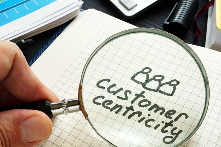 Customer centricity handwritten in a note pad. (AdobeStock)