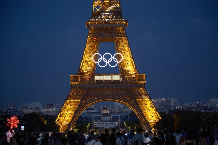 PARIS, FRANCE - JUNE 28: The Olympic rings are seen on the Eiffel Tower on June 28, 2024 in Paris, France. The 2024 Summer Olympic Games begin on July 26. (Photo by Pierre Crom/Getty Images) (	Pierre Crom/Getty Images)