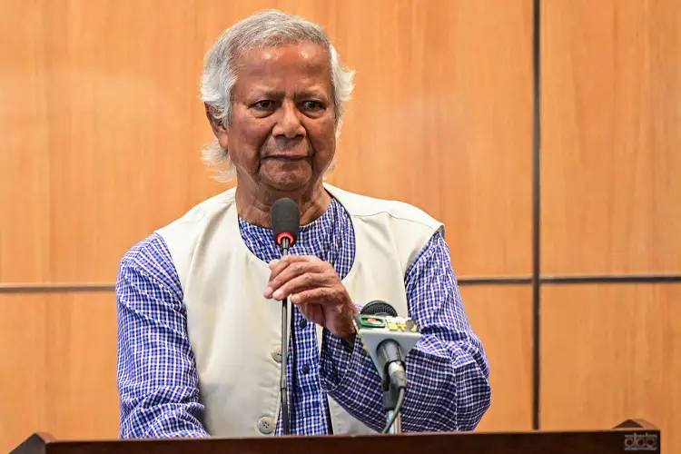 Nobel laureate Muhammad Yunus prepares to address a press conference upon his arrival at the Hazrat Shahjalal International Airport in Dhaka on August 8, 2024. Nobel Peace Prize winner Muhammad Yunus returned to Bangladesh August 8 to lead a caretaker government after a student-led uprising ended the 15-year rule of Sheikh Hasina. (Photo by MUNIR UZ ZAMAN / AFP)