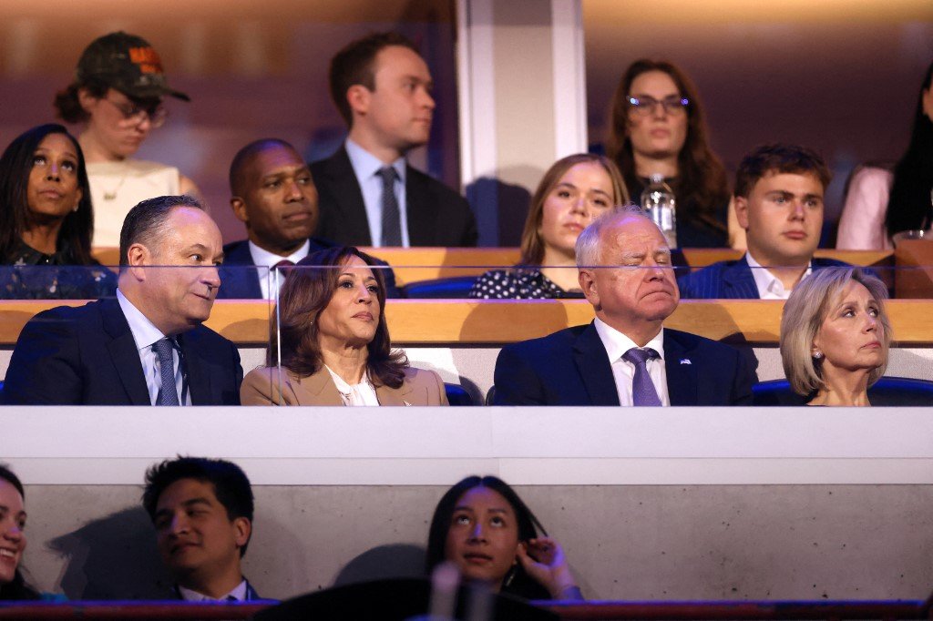 (L-R) US Second Gentleman Douglas Emhoff, US Vice President and 2024 Democratic presidential candidate Kamala Harris, Minnesota Governor and 2024 Democratic vice presidential candidate Tim Walz and his wife Gwen Walz attend the first day of the Democratic National Convention (DNC) at the United Center in Chicago, Illinois, on August 19, 2024. Vice President Kamala Harris will formally accept the partys nomination for president at the DNC which runs from August 19-22 in Chicago. (Photo by CHARLY TRIBALLEAU / AFP)