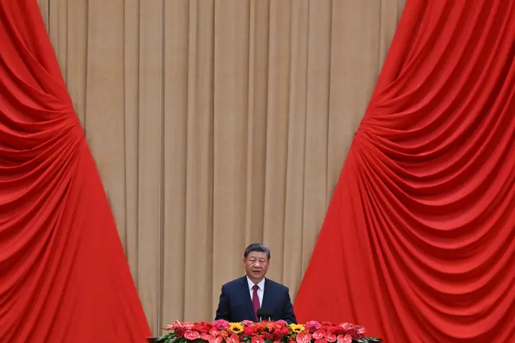 Xi Jinping falou que a China "estimularia" o desenvolvimento de Hong Kong e Macau (Photo by ADEK BERRY / AFP))