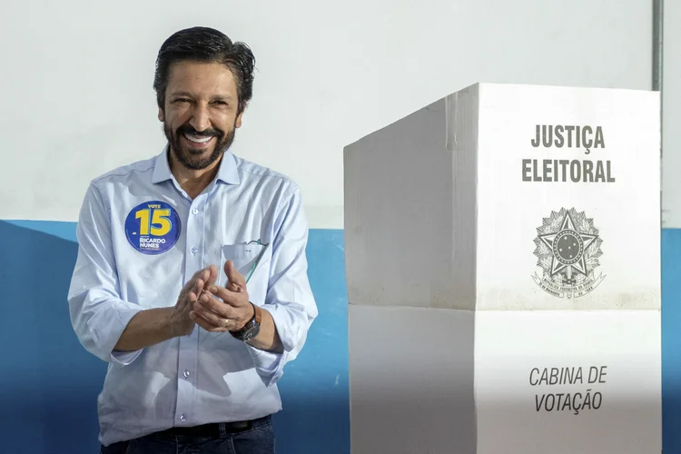 Sao Paulo city mayor and candidate for re-election Ricardo Nunes, of the Movimento Democratico Brasileiro (MDB), reacts after casting his his vote during the municipal elections first round, in Sao Paulo, Brazil, on October 6, 2024. Brazilians go to the polls Sunday to elect mayors and councillors in more than 5,500 cities after a vitriolic, sometimes violent campaign two years after presidential elections that polarized Latin America's biggest country. (Photo by Nilton Fukuda / AFP) (NILTON FUKUDA/AFP)