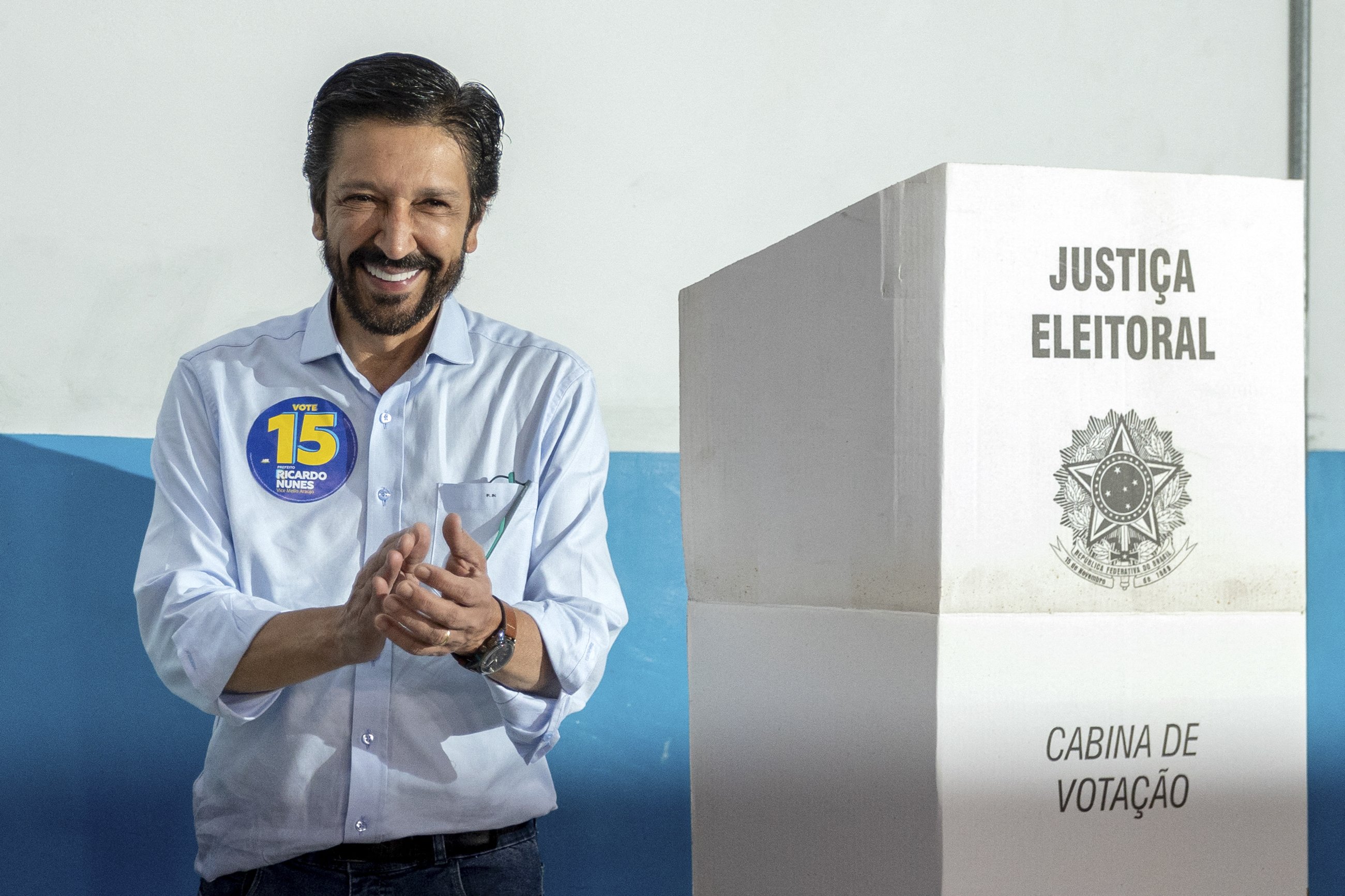 Sao Paulo city mayor and candidate for re-election Ricardo Nunes, of the Movimento Democratico Brasileiro (MDB), reacts after casting his his vote during the municipal elections first round, in Sao Paulo, Brazil, on October 6, 2024. Brazilians go to the polls Sunday to elect mayors and councillors in more than 5,500 cities after a vitriolic, sometimes violent campaign two years after presidential elections that polarized Latin America's biggest country. (Photo by Nilton Fukuda / AFP)