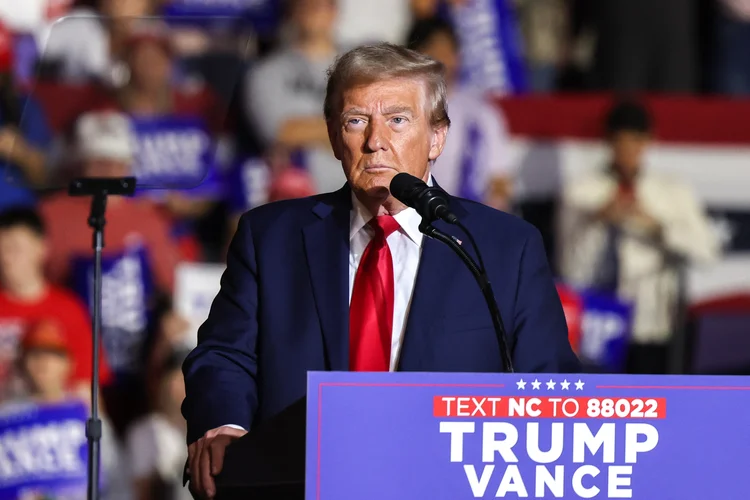 Former US President and Republican presidential candidate Donald Trump speaks during a campaign rally at the Williams Arena at Minges Coliseum in Greenville, North Carolina, October 21, 2024. (Photo by Logan CYRUS / AFP) (Logan CYRUS/AFP)